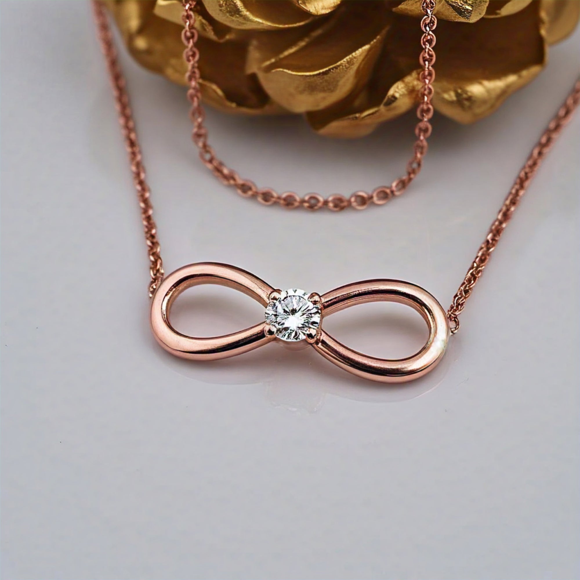 Enyo Rose Gold Moissanite Swarovski Charm Infinity Necklace